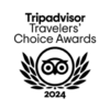 Tripadvisor Travelers' Choice Awards 2024 badge — black owl logo centered in laurel wreath with award text